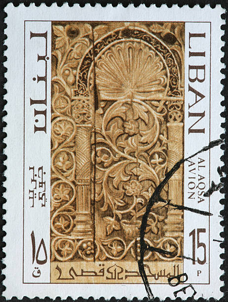 istock carved stone floral design on a stamp from Lebanon 183359062