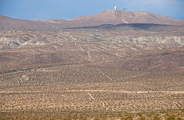 istock Astronomical telescope on moutain in desert 183359223