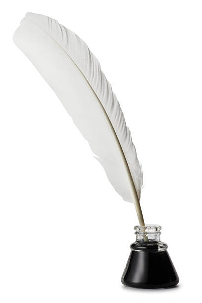 Quill and Inkwell Isolated On A White Background Feather quill in ink well. Clipping path included.To see more pens and letters click on the link below: ink well stock pictures, royalty-free photos & images