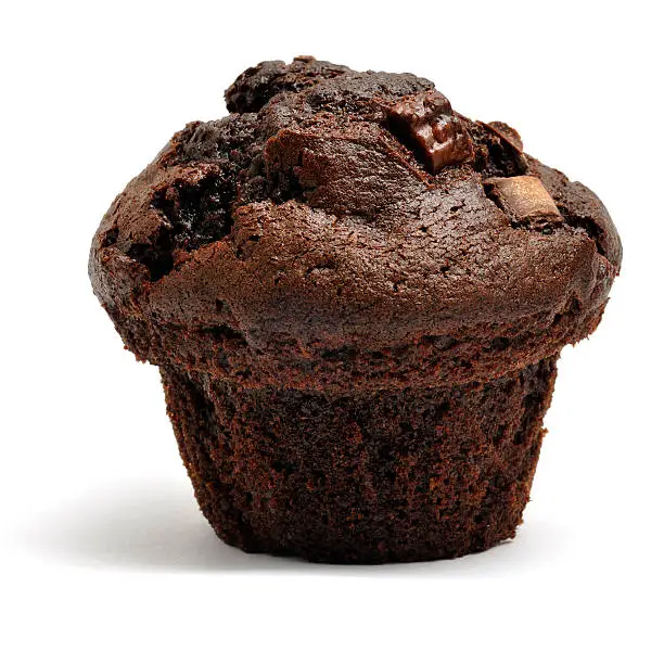 A double chocolate chip muffin isolated on awhite background.
