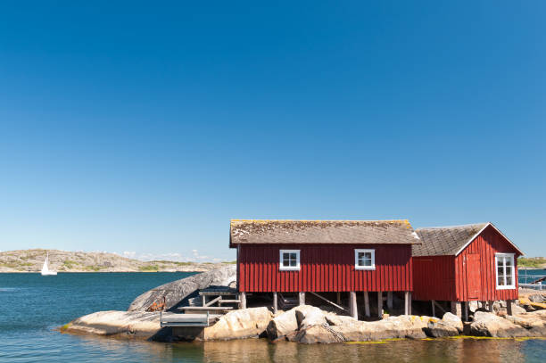 istock Idyllic coastline, huts built on poles 183359469