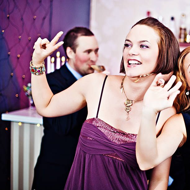 amigos bailando en una fiesta - mixed age flash fotografías e imágenes de stock