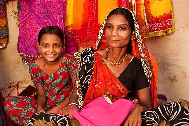 istock Indian woman and her daughter. 183359640