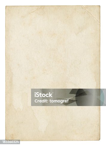 istock An old stained blank piece of beige paper 183360324