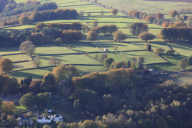 istock Grindleford village and fields above in dappled sunshine 183360604