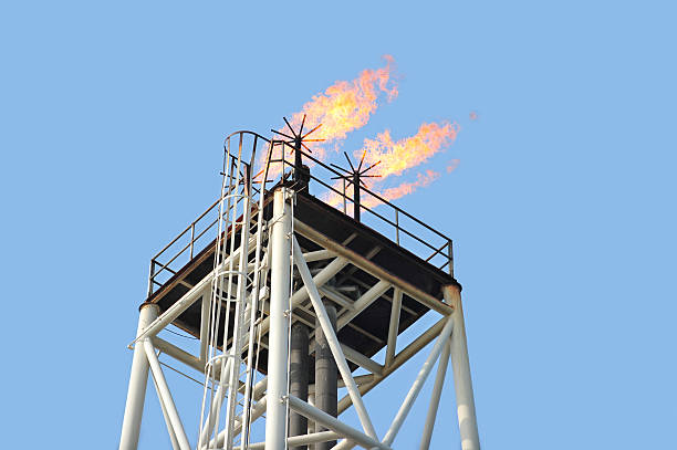 Flame tower at an offshore oil rig gas and Methane stock photo