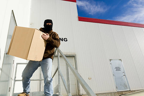 Stealing from a Warehouse stock photo