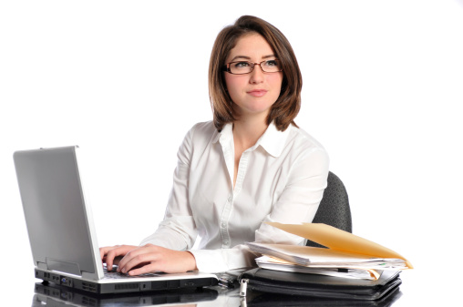 image of attractive young business woman working at her desk