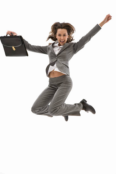 istock Young business woman jump 183361747