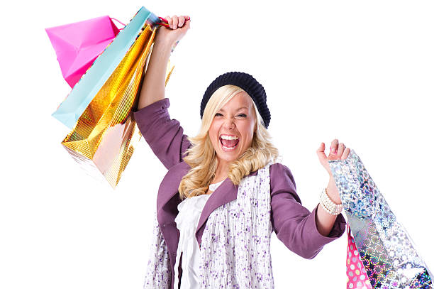istock Young Woman on a Shopping Spree - Isolated 183361752