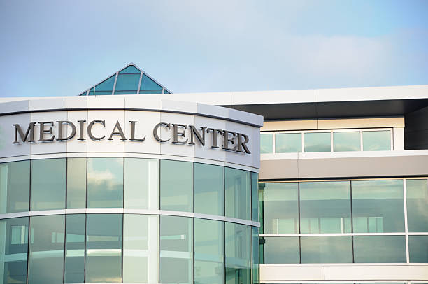 Medical center Modern medical center with sign with copy space medical building stock pictures, royalty-free photos & images