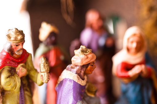 Wooden figurines of Joseph, Mary, Jesus of a nativity scene Christmas creche