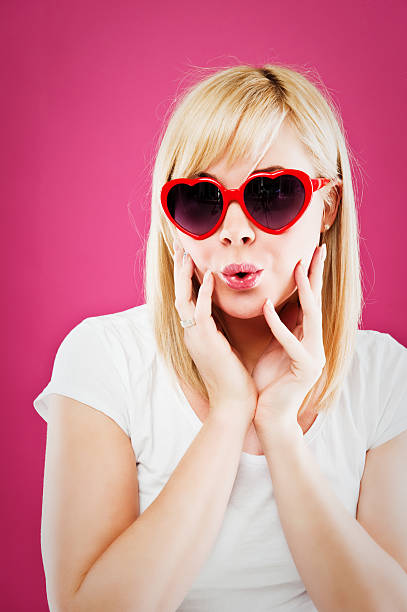 istock woman in heart sun glasses 183362610