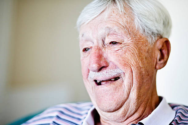 istock Happy old man is amused by something 183363019
