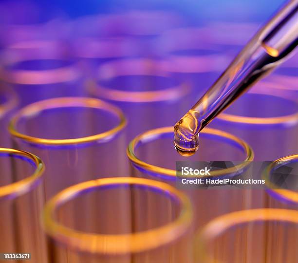 Liquid Drop Falling Into Test Tubes Stock Photo - Download Image Now - Laboratory, Chemistry, Test Tube