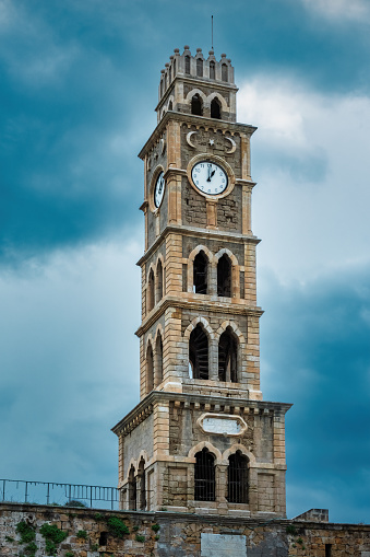 Clock tower of Khan al Umdan (caravanserai) in the Old City of Acre, Israel.