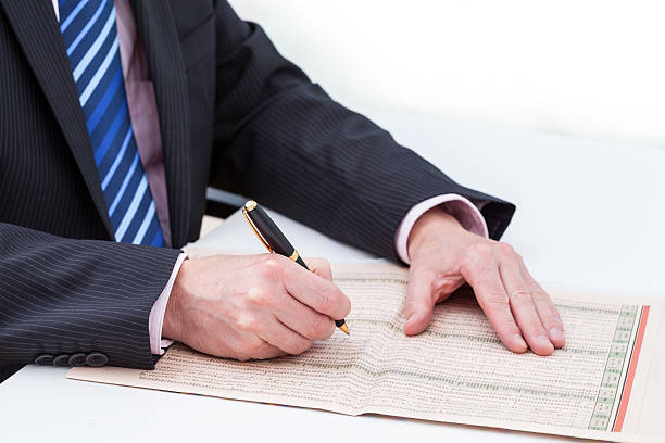 istock Businessman with a newspaper 183364776