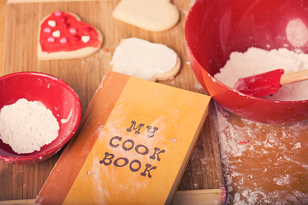 Detail image of Valentine's Day cookies  and a child's cookbook.
