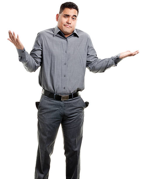 Shrugging Young Man With Empty Pockets Portrait of a young male on a white background. http://s3.amazonaws.com/drbimages/m/jamle.jpg crew cut stock pictures, royalty-free photos & images