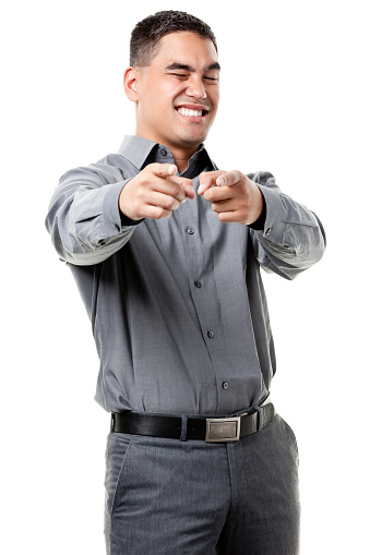 A young man winks and points with both arms at the camera, isolated on a white background. http://s3.amazonaws.com/drbimages/m/jamle.jpg