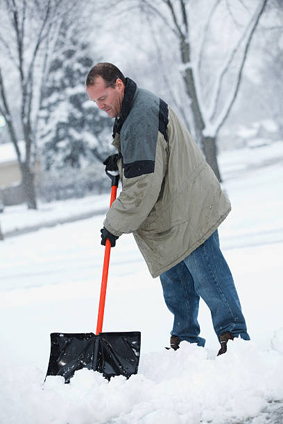 istock Man Shoveling During a Chicago Snow Storm 183365056