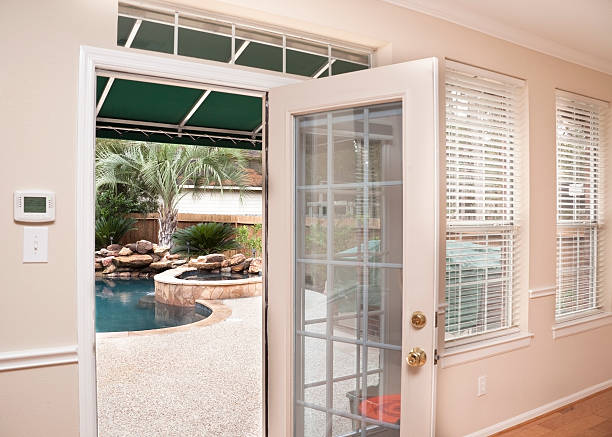 istock Home interior backdoor to patio and pool 183365190