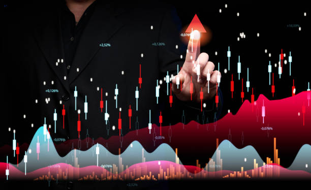 istock Virtual graph with statistical indicators and a businessman's hand points to the peak. Business analysis and forecasting concept 1833653021