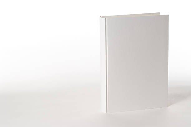 isolato spruzzata di bianco vuoto libro su sfondo bianco - hardcover book foto e immagini stock