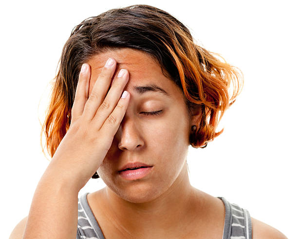 istock Disappointed Young Woman Closes Eyes And Puts Hand Over Face 183365631