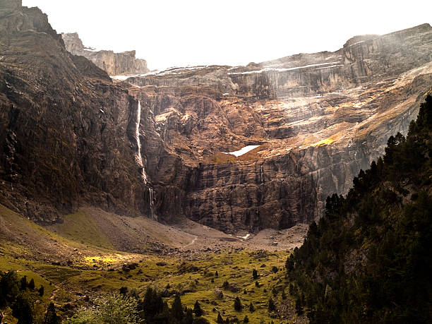 Circus of Gavarnie "The circus of Gavarnie in the Midi-PyrAnAes French.It's a great semicircular wall of 4 km in diameter at the bottom and 14 on top, which fall hundreds of waterfalls, there is a large waterfall. The rock rises from the 1,400 m. until beyond 3000 m. high. It also retains several glaciers.Both the Cirque de Gavarnie and the rest of mountain border with Spain in 1997 has been declared a UNESCO World Heritage, like the Monte Perdido, which is just across the bord." gavarnie stock pictures, royalty-free photos & images