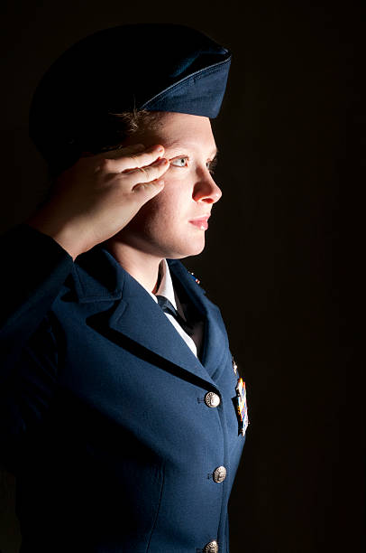 istock Young woman Military Cadet Saluting 183366122