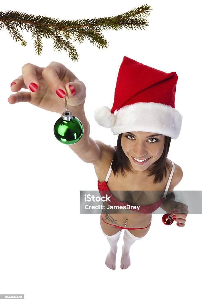 Santa Girl Getting Ready for the Holidays Christmas Stocking Stock Photo