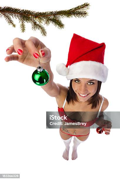 Santa Girl Getting Ready For The Holidays Stock Photo - Download Image Now - Christmas Stocking, White Background, Adult