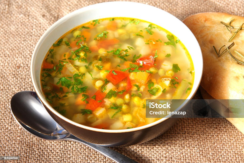 Vegetable soup in white porcelain bowl Vegetable soup Vegetable Soup Stock Photo Vegetable soup in white porcelain bowl Vegetable soup Vegetable Soup Stock Photo