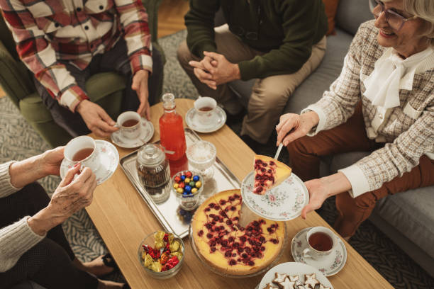 istock Christmas tea party at nursing home 1833672511