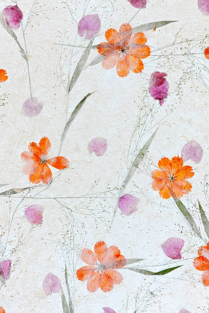 istock Handmade recycled flower and leaf paper background. 183367538
