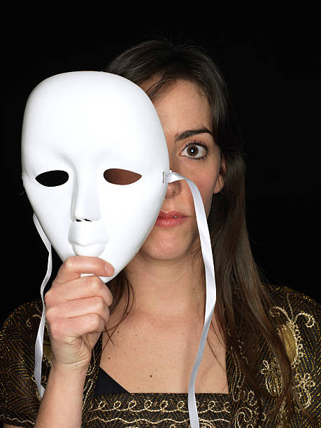 istock Girl reveals the face behind mask 183367585