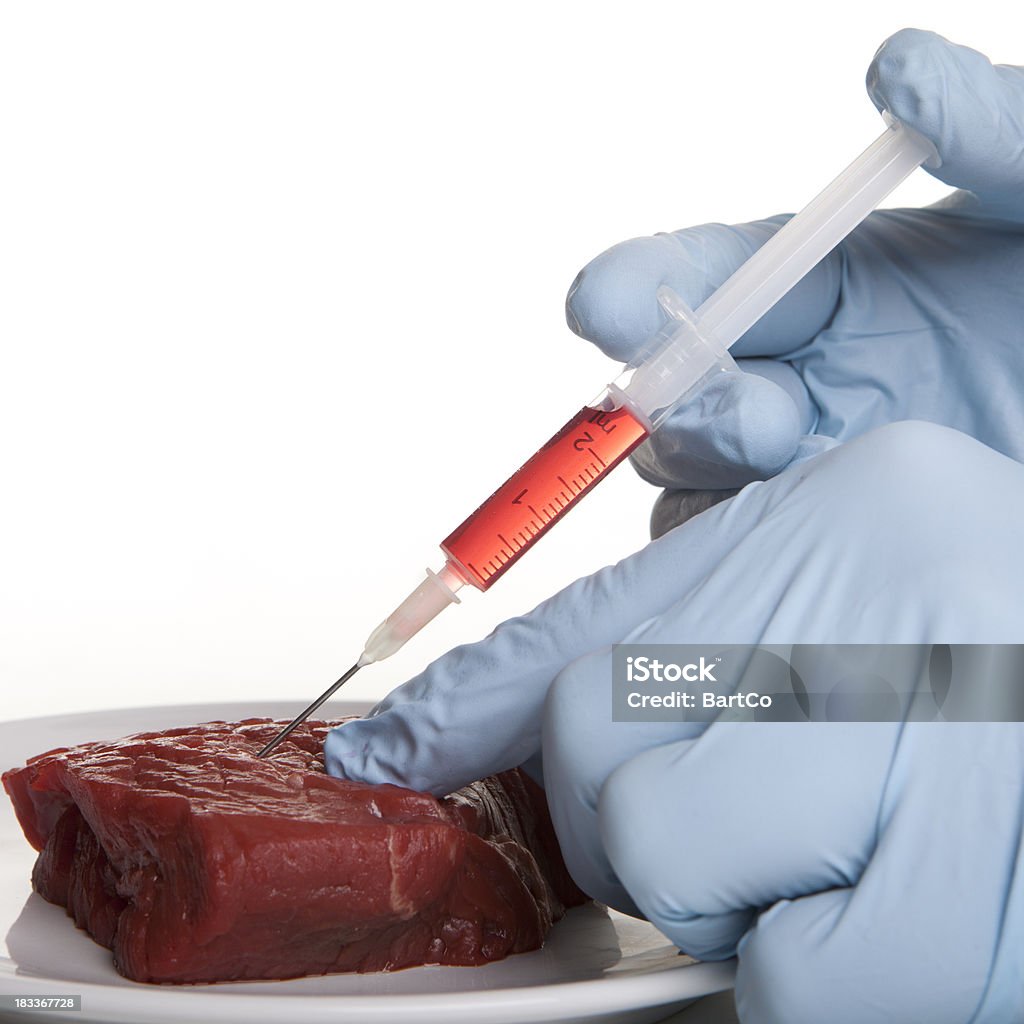 La inyección de las hormonas en la carne. - Foto de stock de Alimento libre de derechos