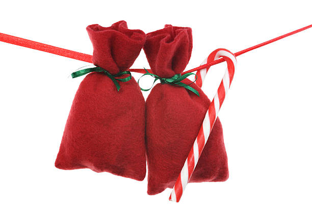 red Christmas bags for advent calendar on a string