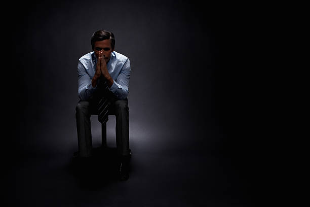 Businessman contemplating options