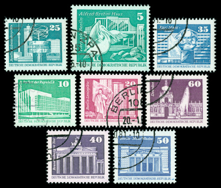 Postage stamps with scenes from Berlin and Dresden, scanned on black background. In aRGB color for beautiful prints.