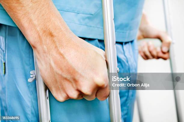 Patient With Crutches Stock Photo - Download Image Now - Crutch, Adult, Adults Only