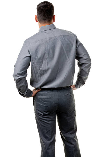 Rear View of Standing Man Portrait of a young male on a white background. crew cut stock pictures, royalty-free photos & images