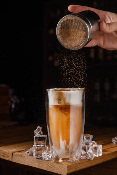 istock coffee drink with cream and ice on a dark wooden background 1833697779