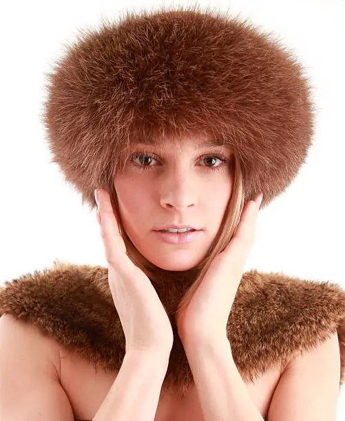 This young woman is looking perfectly beautiful in this fox fur hat and collar!please see more of this same model in my portfolio..Thank you!