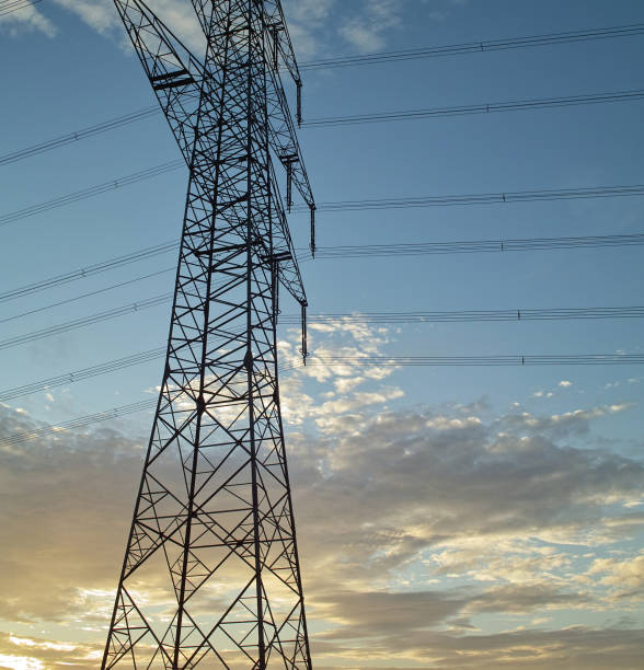 istock large power pylons in sunset 183371056