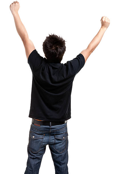 istock Triumphant Young Man Raises Hands, Rear View 183371295