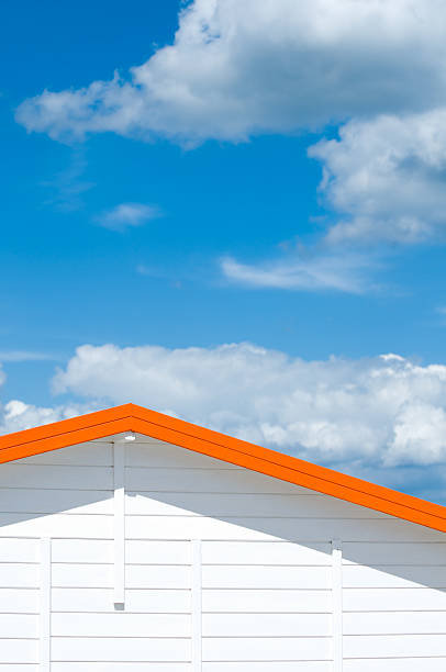 Detail of an orange house roof in the summer stock photo