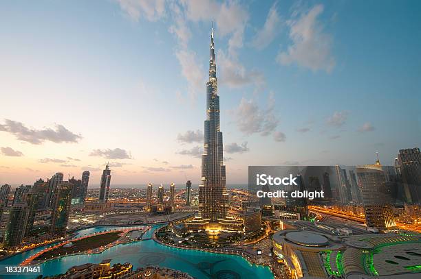 City Lights In Dubai At Sunset Stock Photo - Download Image Now - Dubai, Burj Khalifa, United Arab Emirates