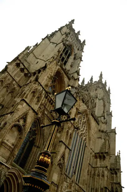 Front upwards view on the York Minster on a grey autumn's day.